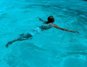 Pellea Fitness - Toronto Canada - Fitness Activity - Man Swimmer Swimming In Pool
