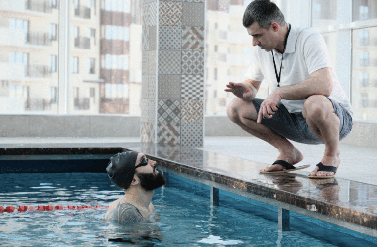 Pellea Fitness - Toronto Canada - Swimming Activity - Swimmer Instructor With Man Swimmer