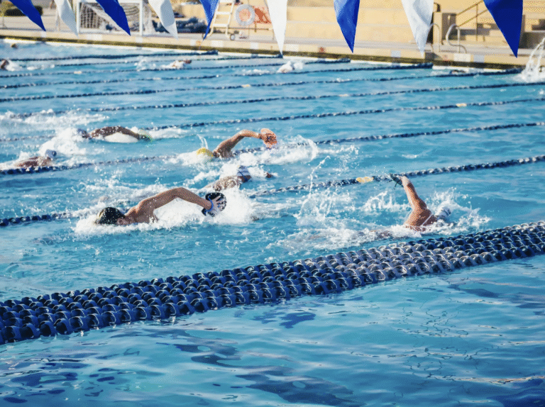 Pellea Fitness - Toronto Canada - Swimming Activity - Freestyle Swimmers In Outdoor Pool